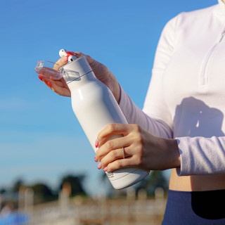 Bouteille thermos avec écouteurs bluetooth